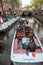 Tourists sightseeing in boat on Mient canal in Alkmaar, North Holland