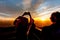 Tourists silhouetted watch and photograph brilliant New Mexico s