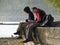 Tourists Sit along Lake Baikal