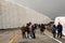 Tourists at snow corridor. Murodo. Tateyama Kurobe alpine route. Japan