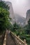 Tourists on steps on mountain trail in Huashan mountain