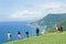 Tourists stop to take in view and the distant Sea Cliff Bridge a