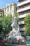 Tourists stroll in front of the statue of Frederic Soler in the Placa del Teatre on Las Ramblas. Best known as Serafi Pitarra, he