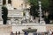 Tourists stroll at historical places at Rome