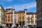 Tourists stroll in Piazza dei Signori in Vicenza