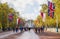 Tourists strolling the Mall leading to Buckingham Royal Palace, London, England, UK