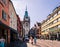 Tourists strolling towards Martinstor, Freiburg, Germany