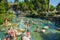 Tourists swim in antique Cleopatra pool