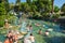 Tourists swim in antique Cleopatra pool