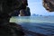 Tourists swim on a kayak among the Karst rocks