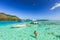 The Tourists swimming and feeding sharks and Stingrays in beautiful sea at Moorae Island, Tahiti PAPEETE, FRENCH POLYNESIA