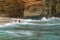 Tourists swimming in the sea, Agkali Beach, Folegandros Island, Greece