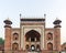 Tourists at the Taj Mahal main entrance gate Agra Rajasthan India