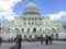 Tourists take photos in front of The United States Congress building in Washington, USA