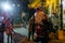 Tourists take pictures with Santa Claus in the evening at the German Colony in Haifa in northern Israel