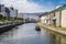 Tourists taking a boat ride along the famous Otaru Canal, or Otaru Unga, in Hokkaido, Japan