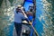 Tourists taking gondola, the traditional Venetian boat, on canal in Venice, Italy