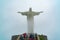 Tourists taking picture in front of the iconic Christ the Redeemer statue