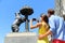 Tourists taking pictures of bear statue in Madrid