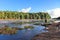 Tourists taking pictures of the river East Berbice front of the Kaieteur falls, Guyana. The waterfall is one of the most beautiful