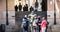 Tourists taking pictures of the Statue of Miguel de Cervantes in toledo, spain