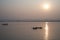 Tourists taking the popular boat tour on the sacred Ganges river in Varanasi, Utta