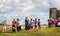 Tourists taking selfies in front of Stonehenge in Wiltshire, UK