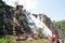 Tourists at Teerathgarh Waterfalls, Central India.