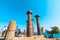Tourists and Temple of Athena in Assos Ancient City ruins