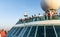 Tourists on the top of a cruise ship looking at the view of Havan Cuba