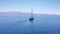 Tourists tour on old style pirate ship on calm clear blue sea Aerial