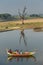 Tourists on traditional boat near U Bein Bridge, Myanmar