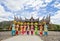 Tourists in traditional clothes posing in front of Istana Basa Pagar Ruyung, landmark of West Sumatera, Indonesia.