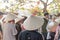 Tourists in traditional Vietnamese bamboo hats, Hoi An, Vietnam