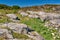 Tourists on the trail along the coast Trondelag island Hitra. The Norwegian North sea coastline.