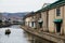 Tourists travel by boat in the Otaru Canal in winter in Hokkaido, Japan