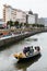 Tourists travel by boat in the Otaru Canal in winter in Hokkaido, Japan