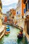 Tourists traveling in gondola, Rio Marin Canal, Venice, Italy