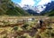 Tourists on the trek to the Esmeralda mountain lagoon, Tierra del Fuego, Argentina