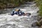 Tourists tubing on the Mindo river in Ecuador