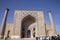 Tourists at Ulug Beg Madrasa, The Registan, Samarkand, Uzbekistan