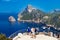 Tourists at vantage point with view Mirador Es Colomer on punta nau at cap formentor majorca mallorca. Balearic islands country of