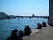 Tourists in Venice city, Italy. Sunny day, travel, bright sea and boats