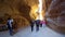 Tourists view the canyon ancient city of Petra in Jordan