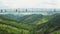 Tourists view landscape on suspension Sky Bridge over valley