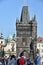 Tourists view Prague from Charles Bridge