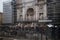 Tourists view repairs of Trevi Fountain, Rome.