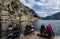 Tourists viewing a landscape of lake Garda