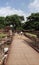 Tourists visit a 1000-year-old archaeological site in Ayutthaya, Thailand, 7/11/2020.