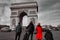 Tourists visit the Arc de Triomphe in Paris